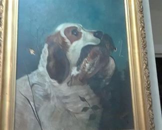 Oil on canvas of hunting dog holding bird; signed by artist