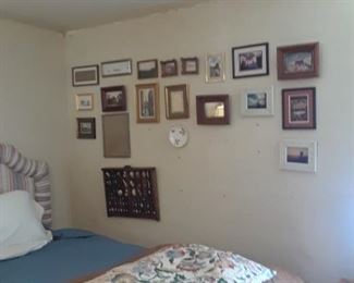 Wall if framed art and memorabilia