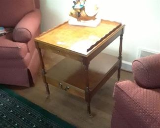 Two level accent table with writing surface pull out just beneathe top, drawer below
