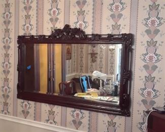 Stately rectangular mirrorwith carved frame