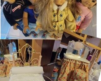 American Girl dolls!!!!!  And check out that bed fit for an American Doll queen!