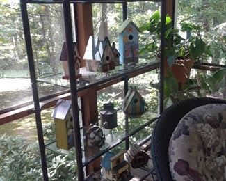 Birdhouses and etagere with glass shelves