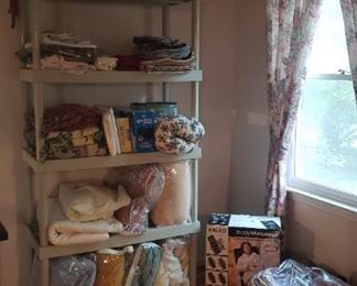 Blankets, exercise mats, sheets, table linens, heating pad
