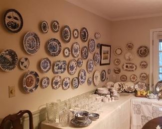 Huge selection of brown and blue transferware plates from England. Japan, US.  Many vintage or antique