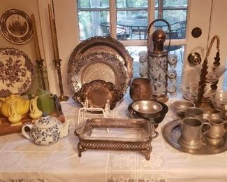 Large selection of pewter and silverplate, plus 50s cocktail shaker and glasses in frame