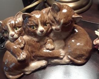 Three kitten figurines