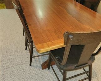 Solid  blackwalnut homemade table and 6 blackwalnut chairs. $975