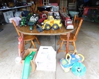 vintage trucks, little tykes toys and dining room table with 2 chairs