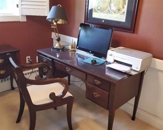 Formal desk with chair