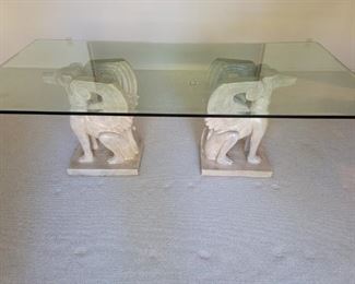Upscale Dining Table: Glass on 2 Mythical Statues      The Winged Dog, Simargl, is from  Eastern Slavic Mythology
84in w x 42in d x 29in h