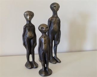 Alien Family Figurines & their Flying Saucer in Cast Aluminum Bronze.  A Fabulous Mid Century Find!
Child 2.5in, Mama 3.25in, and Papa 3.75in