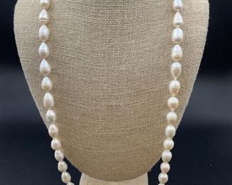Single Strand Hand Knotted Baroque Pearl Necklace
with 14 Karat Gold Clasp