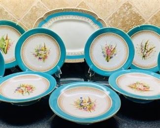(10) Antique Royal Worcester 1878 English China      Royal Worcester China Manufactured in 1978 has a turquoise band with gold rim, brown trim, and different flower images in the center.  At least 3 of the plates are on stands. The oval platter is by same maker and era, but may be a different pattern group.