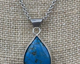 Sterling Silver and Turquoise Necklace - Chain is
28 inches long