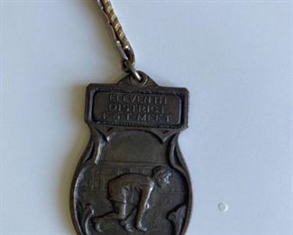 Eleventh District T & F Meet medal
