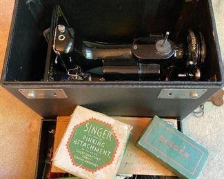 Singer sewing machine with parts and case
