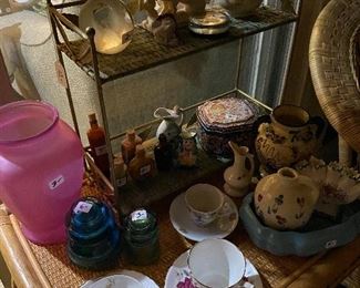 Insulators, cup and saucer sets, Knick knacks.