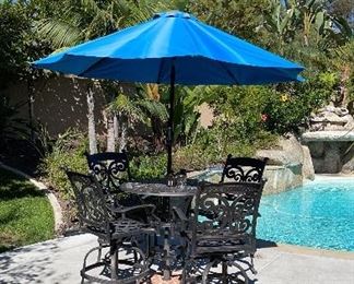 Patio set with blue umbrella