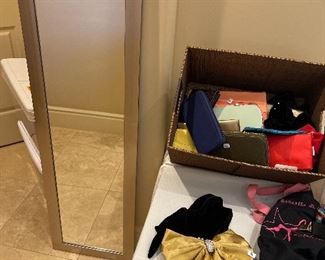 Mirror and loads of wallets purses