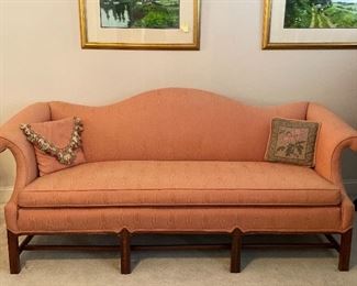 #1008A - Vintage camel back sofa with rolled arms, stands on eight wooden legs connected with a box stretcher, single bench cushion, 72” l. - $225