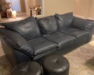 Black Leather Sofa and Two Leather Seats Ottomans