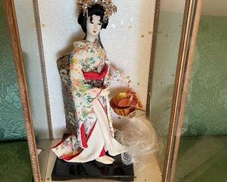 Geisha Girl Encased in Glass Japan