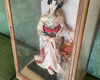Geisha Girl Encased in Glass Japan