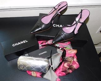 A few Chanel Items including sunglasses and shoes - there is also a black dress in this sale that is Chanel ! 