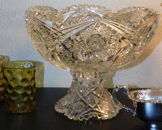 this is a 2 part small "Egg-Nog" Cut Glass bowl...attributed to Libbey 