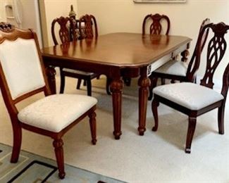 1 of 5 Dinning room table with 2 leaf's and 6 chairs (matches china cabinet)