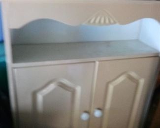 325. BATHROOM CABINET $10