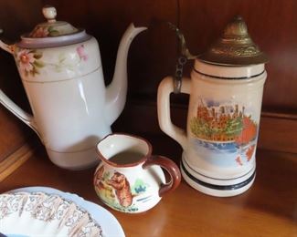 Vintage chocolate pot, German style  stein, souvenir cream pitcher -  all found in hutch. 