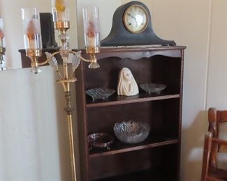 Book case  mantle  clock,, glass  bowls and ceramic figurine   Beautiful art deco floor lamp. 