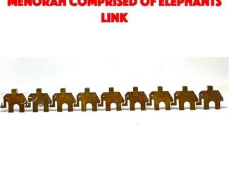 Lot 43 Michael Ende Bronze Menorah Comprised of Elephants Link