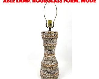 Lot 168 Italian Glazed Pottery able Lamp. Hourglass form. Mode