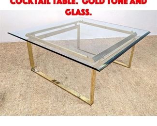 Lot 344 80s Modern Coffee Cocktail Table. Gold Tone and Glass.