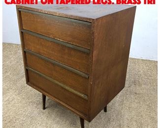 Lot 470 Small Modernist Side Cabinet on tapered legs. Brass Tri