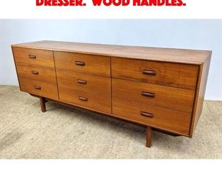 Lot 494 Danish Modern Teak Low Dresser. Wood handles. 