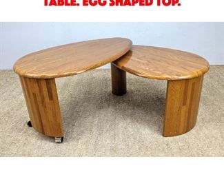 Lot 513 Modernist Oak Swivel Top Table. Egg shaped top. 