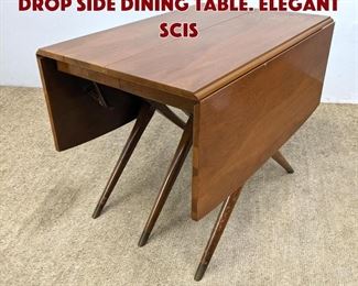 Lot 640 CRADDOCK Modernist Drop Side Dining Table. Elegant Scis