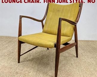 Lot 910 Rosewood Swoop Arm Lounge Chair. Finn Juhl style. no 