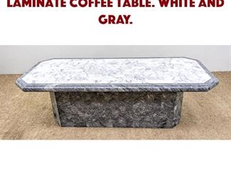 Lot 1104 Decorator Marble Laminate Coffee Table. White and gray.