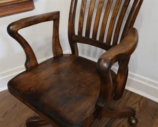 Vintage ca. 1930s-1940s office chair, refinished, with new, period appropriate casters.