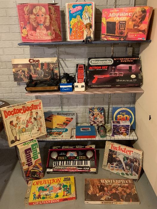 Lots of toys/games. Older Nintendo, Atari, Barbie