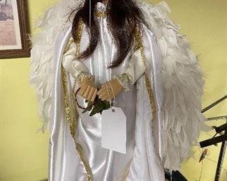 Hand-made in Italy, marionette, with hand stitched adornments and feathers (Purchased for $750)