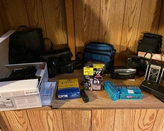 Various vintage cameras and electronics