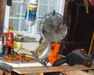 Vintage fan & tools in garage