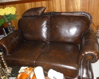 Nice leather loveseat w/tack trim