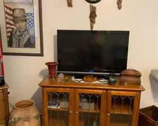 TV, wood and leaded glass cabinet