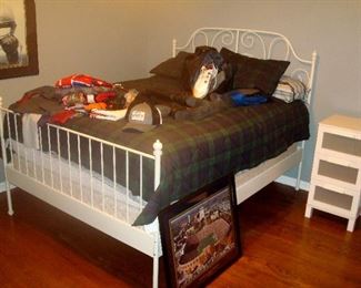Wrought iron king bed and mattress set and other items.
